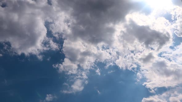 Timelapse summer clouds on blue sky