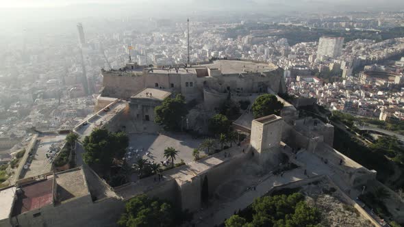 Aerial ascending view of Alicante Cityscape from Fortress of Santa Barbara, Spain