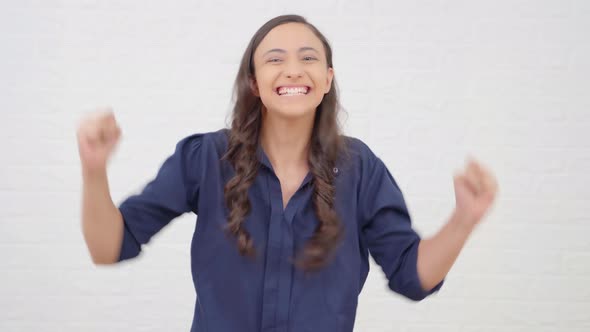 Excited Indian girl cheering