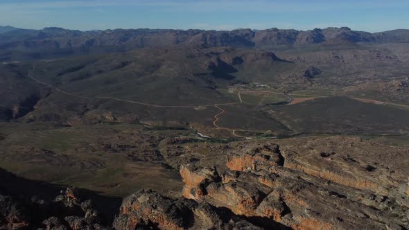 Drone shot of Cederberg near Cape Town - drone is panning facing the Cederberg valley. Snippet could