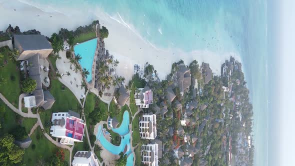 Vertical Video of the Beach on Zanzibar Island Tanzania Aerial View