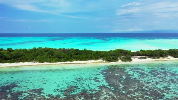 Aerial landscape of marine sea view beach journey by aqua blue sea and white sandy background of a d