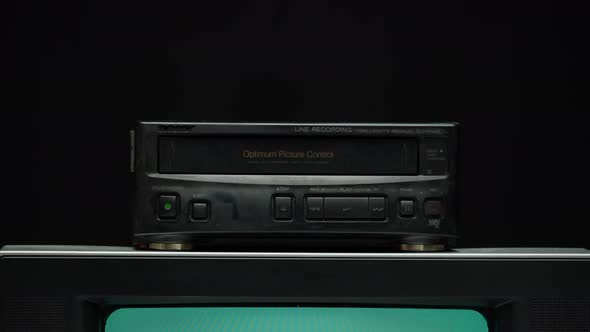 Taking Video Cassette From Recorder