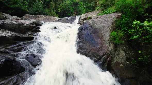 Hin lat waterfall, long partly speeded drone shot