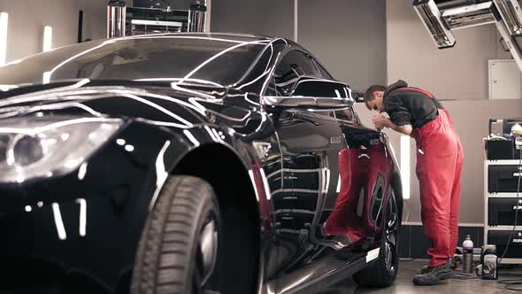 Process of Polishing Stunning New Black Car