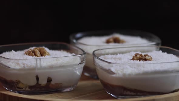 Tasty Desserts with Topping Coconut Flakes