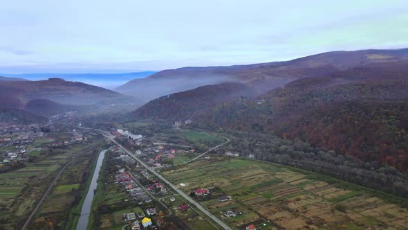 Aerial panorama view of village rural area with small houses