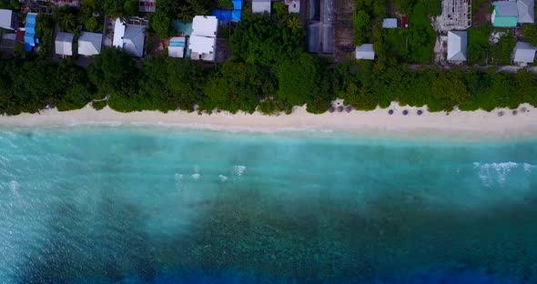 Natural aerial travel shot of a summer white paradise sand beach and aqua blue ocean background in h