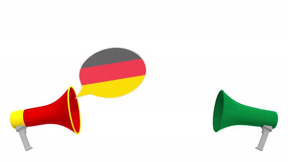 Flags of Saudi Arabia and Germany on Speech Balloons alt