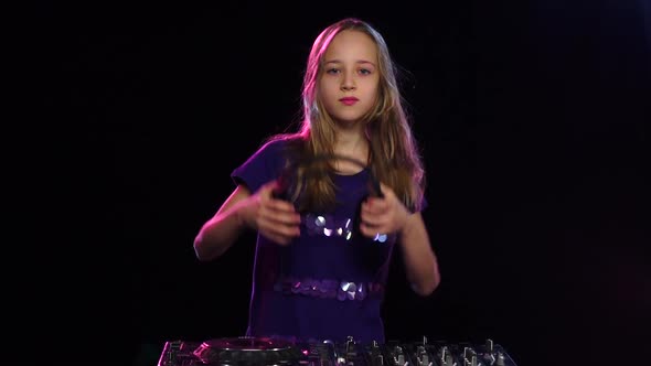 Teenage Girl Dj Wears Headphones and Starts Dance. Slow Motion