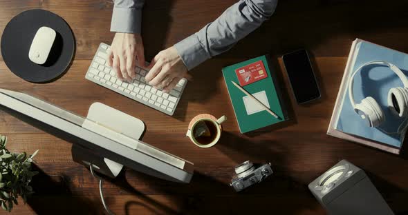 Businessman sitting at office desk and working