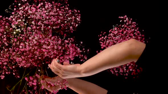 Fast Footage of Woman Hands Doing a Bouquet with Pink Flowers.