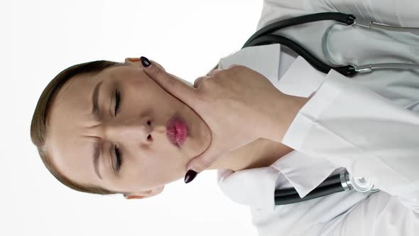 Vertical Shot Attractive Female Therapist in Medical Coat Reacts to Poor Patients Tests