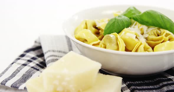 Bowl of cooked pasta with cheese