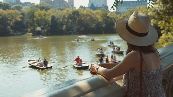 Young girl looking at boats