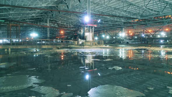 Mineral Waters are Surrounding the Premises of a Mining Factory