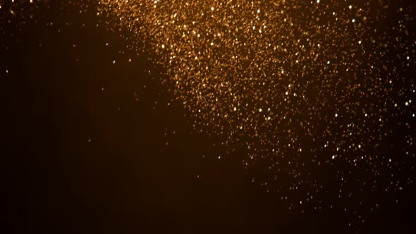 Golden Glitter Background in Super Slow Motion at 1000Fps alt