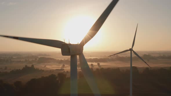 Wind Turbine Farm with Beautiful Landscape at Sunrise