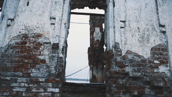 Demolished Old Building Red Brick Walls in Middle of Frozen Lake