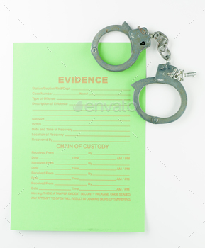 e evidence and a pair of handcuffs, with keys, against a white background