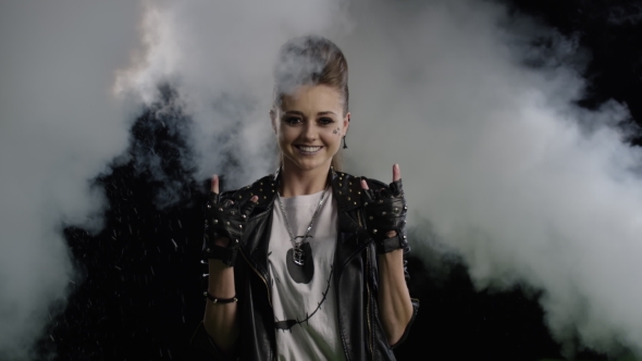 Girl Showing Rock Gesture