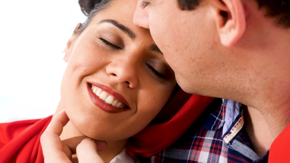 Woman Lying in the Arm of Man with Eyes Closed