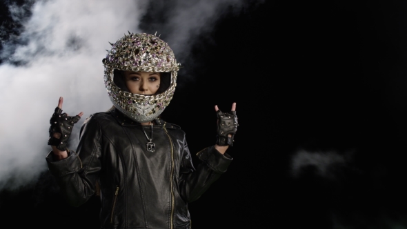 Young Woman Dressed in Rock Biker Style