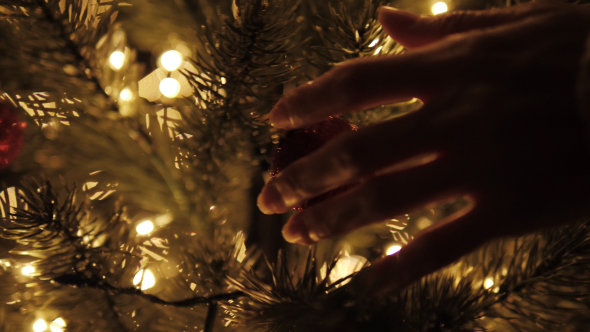 Touch Christmas Ball On Tree