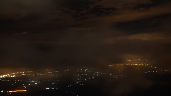 Thick Fog Covered the City Lights at Night
