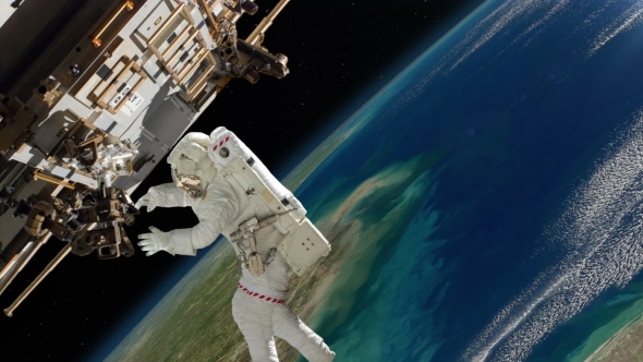 Astronaut Working On International Space Station alt