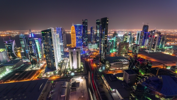 Skycreapers with Night Lights in Downtown of Doha in Qatar 