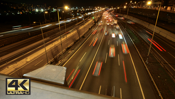 Highway Traffic Cars Driving at Multiple Lane Speedway