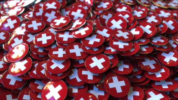 Pile of Badges Featuring Flags of Switzerland alt