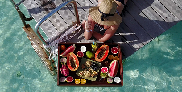 Girl Eating Huge Tropical Fruit Platter in Bikini