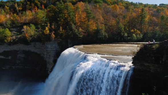 Letchworth State Park. Tourists Admire the Beautiful Waterfall and Autumn Forest