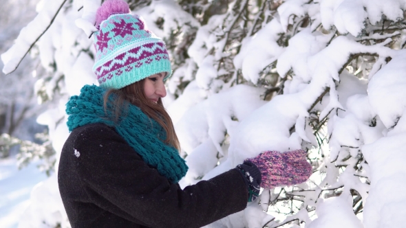 Girl Having Fun Near Snow Tree