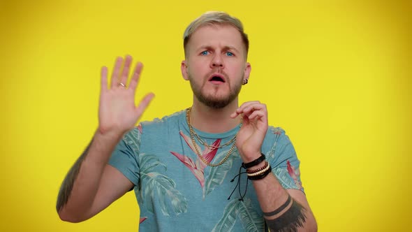 Man Scream with Hand Near Mouth Waving and Greeting with Hand As Notices Someone Shouting Hello