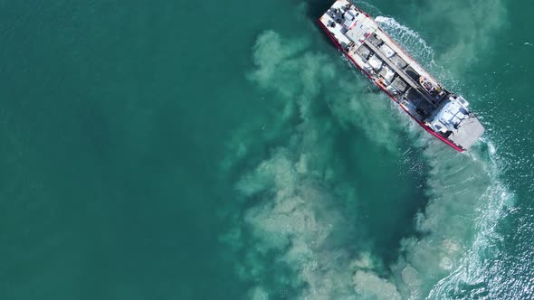 Unique high view of the environmental impact to a sensitive marine precinct cause by a large industr