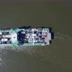Aerial view of the ferry carrying cars to the other side of the river. - VideoHive Item for Sale