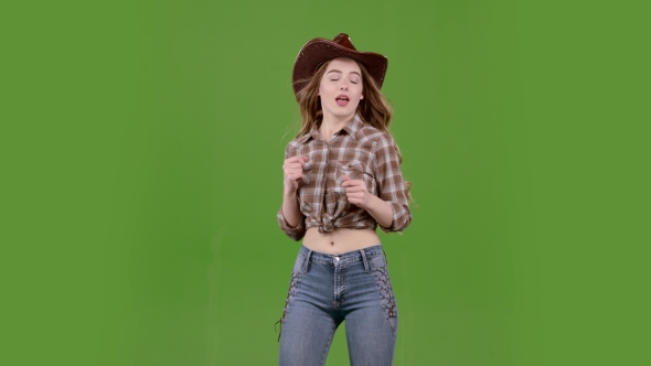 Cowboy Girl Dances Energetic Dances and Sings. Green Screen.