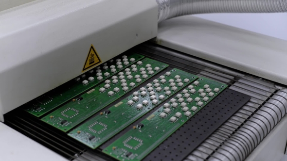 Electronic Printed Circuit Board Leaves From Air Convection Reflow Oven