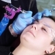 Beautician, Specialist of Permanent Make-up Is Applying Local Anesthetic Before the Eyebrows - VideoHive Item for Sale