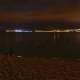 of Night City and Sea with Small Waves. - VideoHive Item for Sale