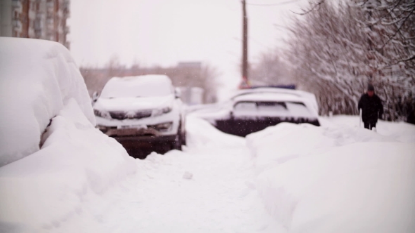 Cars Covered with Snow in a Residential Area of Moscow.