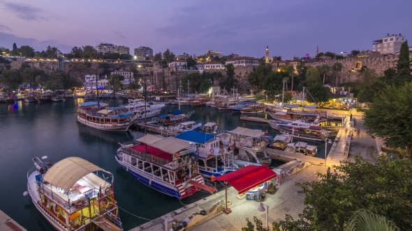 Aerial View of Yacht Harbor and Red House Roofs in "Old Town" Day To Night  Antalya, Turkey.