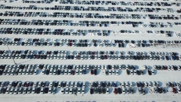 Aerial View of New Car Storage Parking. Market for Sales in Winter