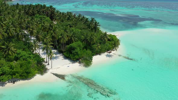 Tropical overhead abstract shot of a white sandy paradise beach and blue sea background in best quality