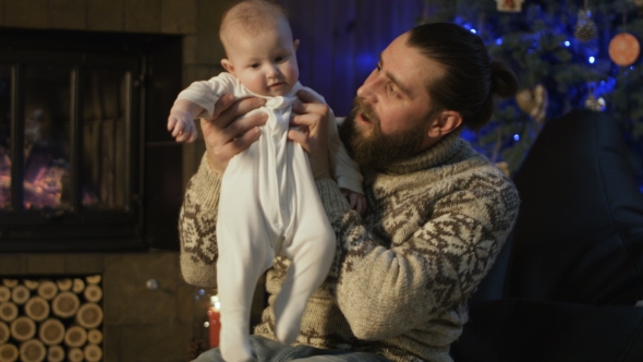 Bearded Man with Toddler Baby Having Christmas