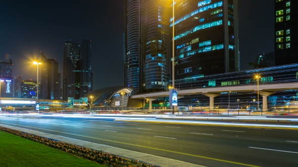 Car Traffic on Sheikh Zayed Road at Night in Downtown, Burj Khalifa Dubai Mall Metro Station