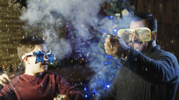 Excited Man with Son Blowing Up Crackers